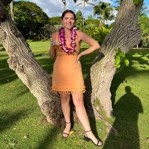 Orange mini dress with Pom detail